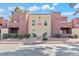 Attractive condo exterior with well-maintained landscaping and stucco siding in a desert community at 4050 Pacific Harbors Dr # 229, Las Vegas, NV 89121