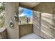 Cozy balcony featuring decorative wall planters, stucco walls, and a view of neighboring buildings at 4400 S Jones Blvd # 2103, Las Vegas, NV 89103