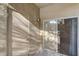 Condo balcony featuring a storage closet and sliding glass doors, offering convenient outdoor access at 4400 S Jones Blvd # 2103, Las Vegas, NV 89103