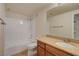 Clean bathroom featuring a shower-tub combo and granite vanity at 4400 S Jones Blvd # 2103, Las Vegas, NV 89103