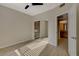 Spacious bedroom showcases a walk-in closet and neutral walls/flooring at 4400 S Jones Blvd # 2103, Las Vegas, NV 89103