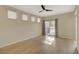 Spacious primary bedroom with light-colored hardwood floors, and patio access at 4400 S Jones Blvd # 2103, Las Vegas, NV 89103