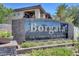 Elegant 'Borgata' sign amidst lush greenery, marking the entrance to the condominium homes at 4400 S Jones Blvd # 2103, Las Vegas, NV 89103
