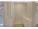 Bright entryway featuring a white front door, built-in shelving, and natural light from a window at 4400 S Jones Blvd # 2103, Las Vegas, NV 89103