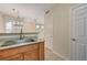 Bright kitchen area with granite countertops, stainless sink and a doorway to the laundry at 4400 S Jones Blvd # 2103, Las Vegas, NV 89103