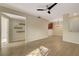 Open-concept living space with modern light fixture, vinyl floors, and ample room to entertain at 4400 S Jones Blvd # 2103, Las Vegas, NV 89103