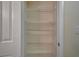 Linen closet with multiple wire shelves for easy organization and storage at 4400 S Jones Blvd # 2103, Las Vegas, NV 89103