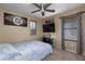 Inviting bedroom with ceiling fan and natural light, with neutral walls and a cozy feel at 4804 Portola Vista Ave, Las Vegas, NV 89139