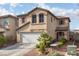 Charming two-story home with a well-maintained yard and a two-car garage at 4804 Portola Vista Ave, Las Vegas, NV 89139