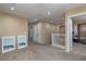 Upstairs landing with neutral carpet, natural light and access to multiple bedrooms at 4804 Portola Vista Ave, Las Vegas, NV 89139