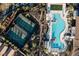 Aerial view of the community with tennis courts and resort-style swimming pool at 6 Harlow View Ct # 18, Henderson, NV 89012