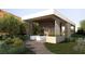 Modern covered structure with two spa tubs and landscaped surroundings at 6 Harlow View Ct # 18, Henderson, NV 89012