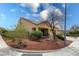 Charming single-Gathering home featuring a well-maintained lawn, mature trees, and a three-car garage at 6636 Brent Scott St, North Las Vegas, NV 89086