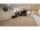 Large open loft area with a ceiling fan and media center at 6636 Brent Scott St, North Las Vegas, NV 89086