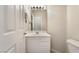 Compact bathroom featuring a single vanity and ample lighting at 7013 Pacific Coast St, Las Vegas, NV 89148