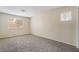 Bright bedroom with ample natural light, carpet flooring, and a clean, minimalist design at 7013 Pacific Coast St, Las Vegas, NV 89148