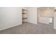 Spacious bedroom with built in desk and neutral walls at 7013 Pacific Coast St, Las Vegas, NV 89148