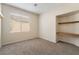 Bright bedroom with a built-in desk and shelving at 7013 Pacific Coast St, Las Vegas, NV 89148