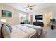 Comfortable main bedroom features modern decor and an ensuite bathroom at 7013 Pacific Coast St, Las Vegas, NV 89148