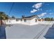 Large private backyard with a freshly painted patio, perfect for outdoor activities and entertaining at 724 N 9Th St, Las Vegas, NV 89101