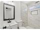 Beautifully remodeled bathroom with a modern vanity, stylish tile, and walk-in shower at 724 N 9Th St, Las Vegas, NV 89101