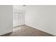 Cozy bedroom features neutral carpet, a window for natural light, and a fresh coat of paint at 724 N 9Th St, Las Vegas, NV 89101
