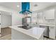 Open kitchen design with stainless appliances, quartz countertops, and modern cabinetry at 724 N 9Th St, Las Vegas, NV 89101
