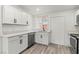 Beautiful kitchen with stainless steel appliances, white cabinets, and modern countertops at 724 N 9Th St, Las Vegas, NV 89101