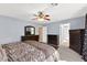 Spacious bedroom shows neutral paint, carpet and ensuite bath at 7505 Mission Palm St, Las Vegas, NV 89139