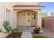 Charming front porch with colorful flowers and manicured landscaping at 7505 Mission Palm St, Las Vegas, NV 89139