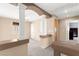 Open loft area featuring decorative columns and a view into another room at 7505 Mission Palm St, Las Vegas, NV 89139