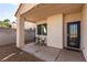 Inviting covered back patio with seating area, perfect for outdoor relaxation and entertaining at 7628 Picnic St, Las Vegas, NV 89131