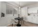 Cozy dining area featuring a modern chandelier and a bright, window-lit setting at 7628 Picnic St, Las Vegas, NV 89131