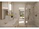 Jack and Jill bathroom features double sinks, white marble countertops and shower with pebble flooring at 8 Rue Du Ville Way, Henderson, NV 89011