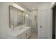 Ensuite bathroom features marble countertops and large glass enclosed shower at 8 Rue Du Ville Way, Henderson, NV 89011