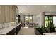 Dining area boasts an eye-catching view and modern lighting with natural elements at 8 Rue Du Ville Way, Henderson, NV 89011