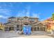 New construction home featuring a three-car garage and modern design under a blue sky at 8 Rue Du Ville Way, Henderson, NV 89011