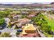 Aerial view of a home under construction with a great view of the lake and golf course in a desert community at 8 Rue Du Ville Way, Henderson, NV 89011