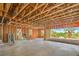 Unfinished garage with a large opening providing scenic views of desert landscaping at 8 Rue Du Ville Way, Henderson, NV 89011