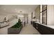 Open-concept kitchen featuring a marble island, wine storage and a plant accent at 8 Rue Du Ville Way, Henderson, NV 89011