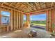 Unfinished living space with panoramic views from expansive windows, providing ample natural light and scenic beauty at 8 Rue Du Ville Way, Henderson, NV 89011
