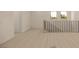 Open loft area with hardwood floors and a contemporary railing, offering a flexible space for various uses at 8 Rue Du Ville Way, Henderson, NV 89011