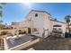 Expansive backyard with covered patio, built-in grill, and ample space for outdoor entertaining at 8012 Pottery Creek Dr, Las Vegas, NV 89128