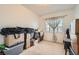 Neutral carpeted bedroom filled with boxes ready to be moved in or out at 8476 Tackle Box Ct, Las Vegas, NV 89113