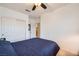 Comfortable bedroom includes carpet, closet, and adjacent hall at 8476 Tackle Box Ct, Las Vegas, NV 89113
