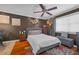 Relaxing bedroom with a comfortable bed, stylish accents, and a ceiling fan for a restful retreat at 8600 W Charleston Blvd # 2078, Las Vegas, NV 89117