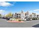 Well-maintained exterior view showing the building and parking with covered spots at 8600 W Charleston Blvd # 2078, Las Vegas, NV 89117