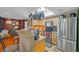 Bright, airy kitchen with stainless steel appliances, bar seating, and pot rack at 8600 W Charleston Blvd # 2078, Las Vegas, NV 89117