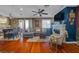 Inviting living room features hardwood floors, fireplace, ceiling fan and comfortable seating at 8600 W Charleston Blvd # 2078, Las Vegas, NV 89117