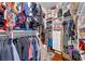 Spacious walk-in closet offers ample storage with built-in shelving, hanging rods, and organized compartments at 8600 W Charleston Blvd # 2078, Las Vegas, NV 89117
